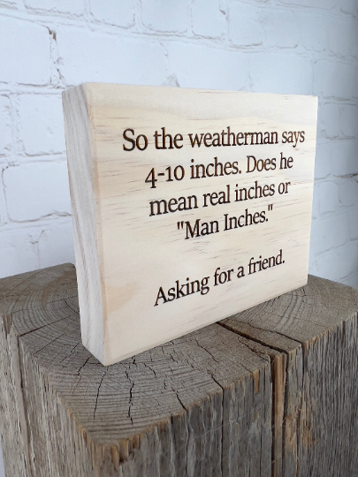 Funny "Man Inches" Sign