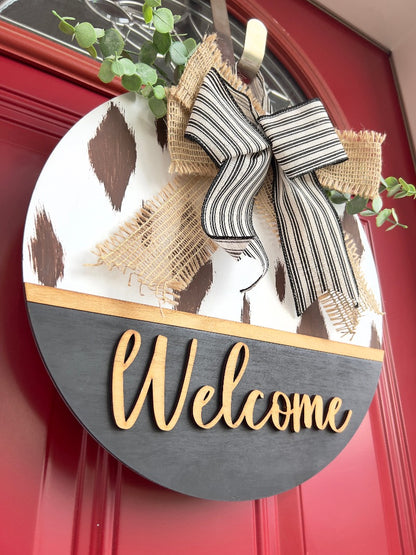 Cow print welcome door hanger